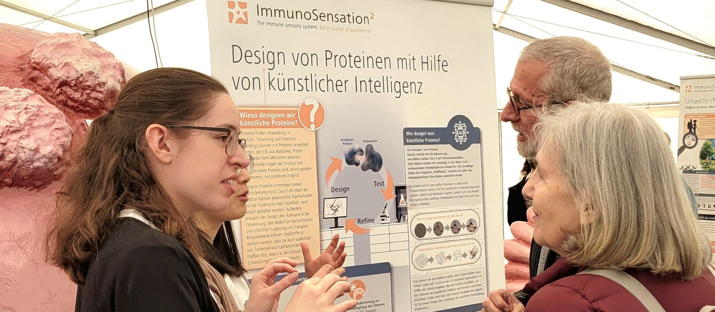 Scientists explain their research to visitors at the "Day of Immunology" event in Bonn