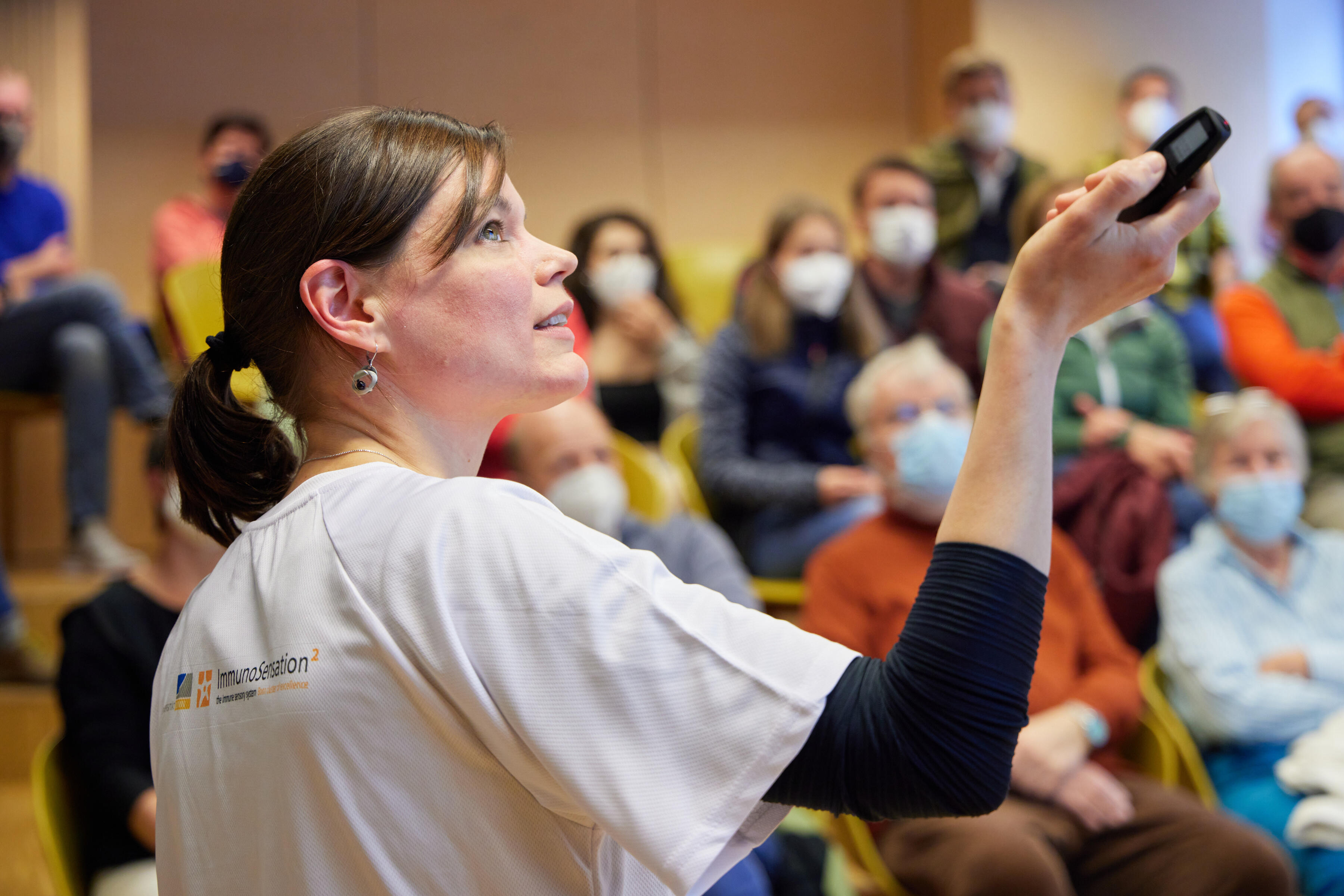 Anette Christ giving a talk at the day of immunology