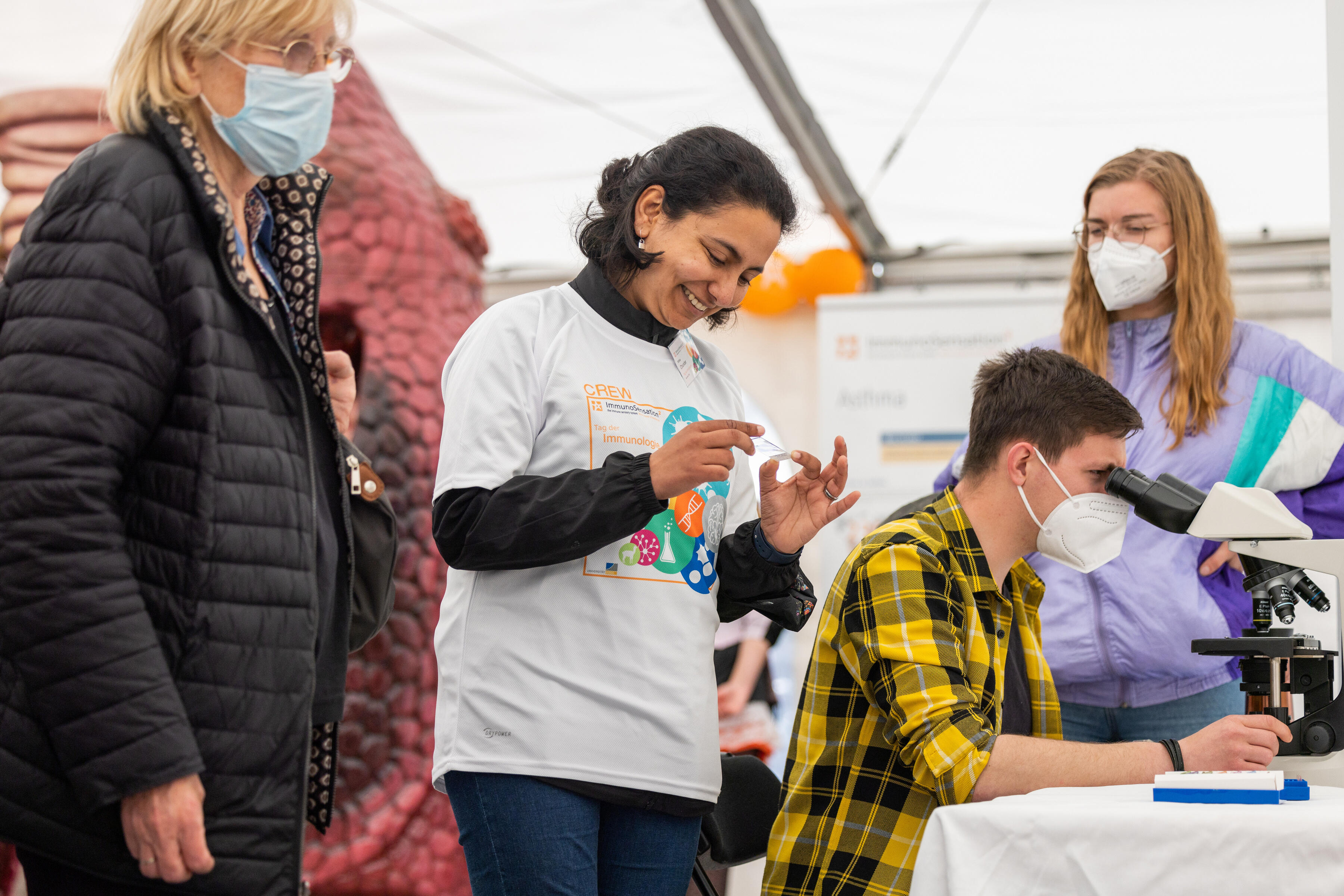 Day of Immunology, Scientist speaking with people